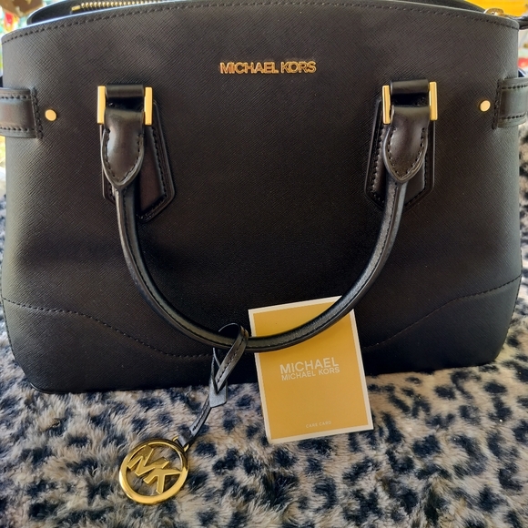 Michael Kors Handbags - Michael Kors Black Dome Leather Handbag Like New EUC But Light Scratches On Feet